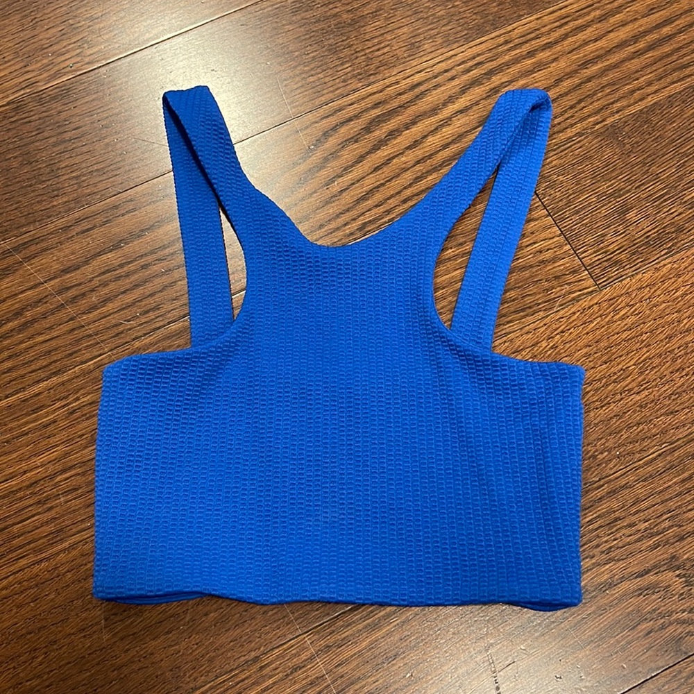 Selling a brand new Zara shirt it is bright blue and a size S.